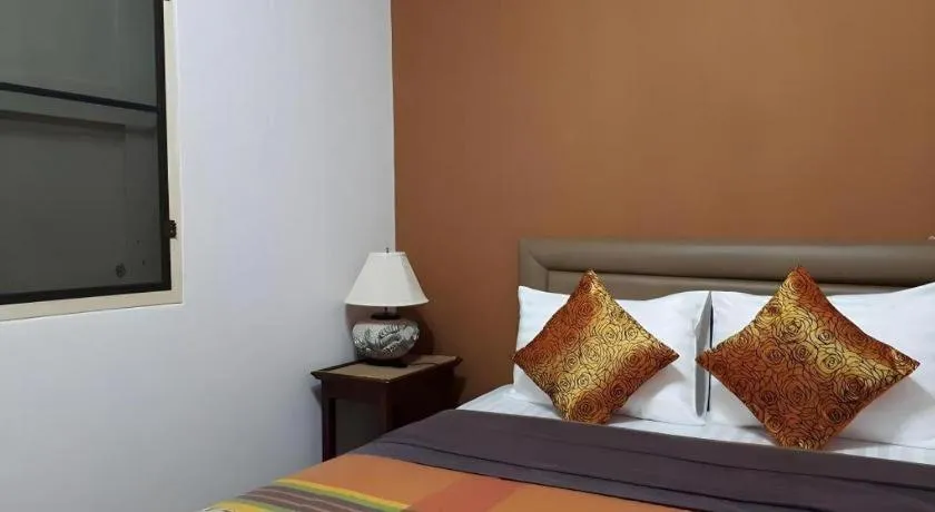 Bed in Palm Sweet Hotel