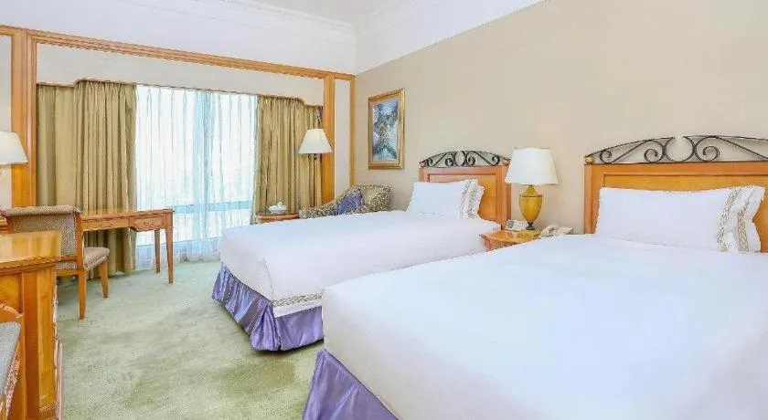 Bed in Regency Hotel