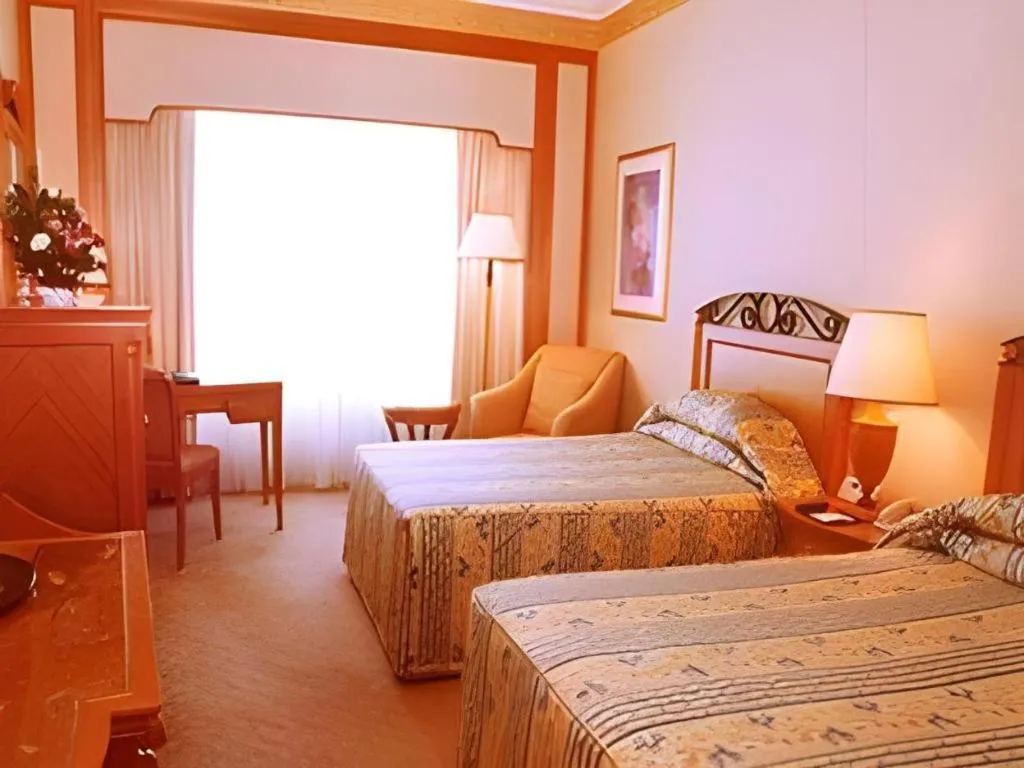 Bed in Regency Hotel