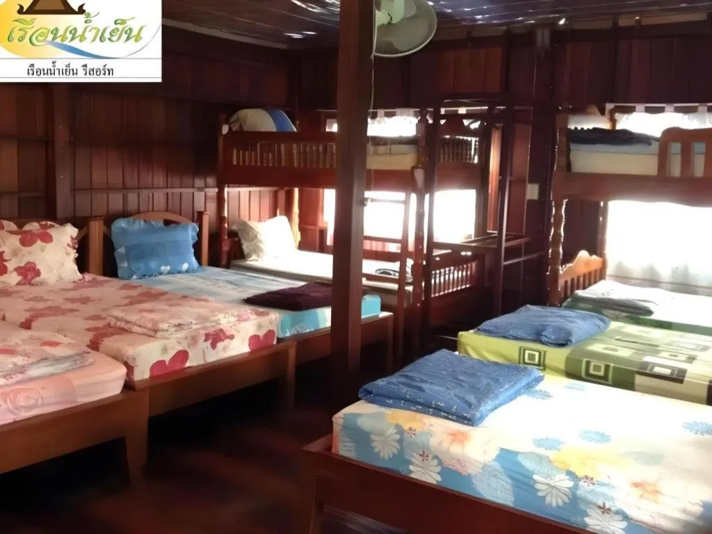 Bed in RuenNamyen Resort Amphawa