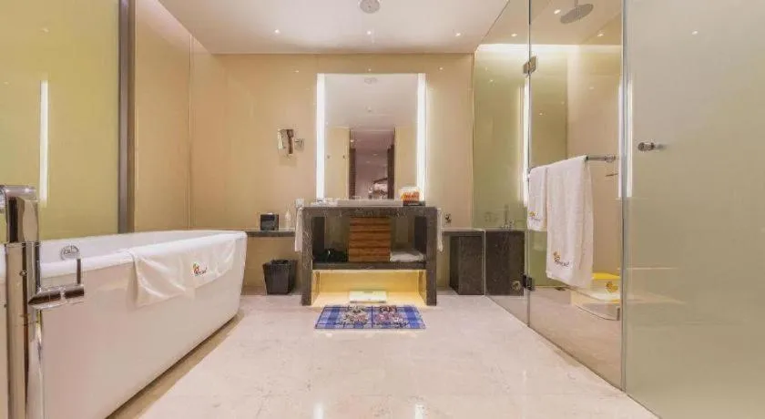 Bed in New World Guiyang Hotel