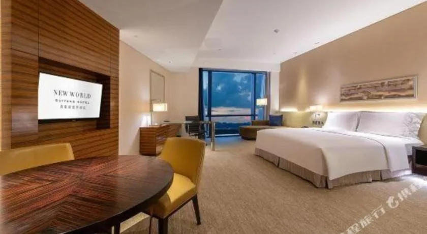 Bed in New World Guiyang Hotel