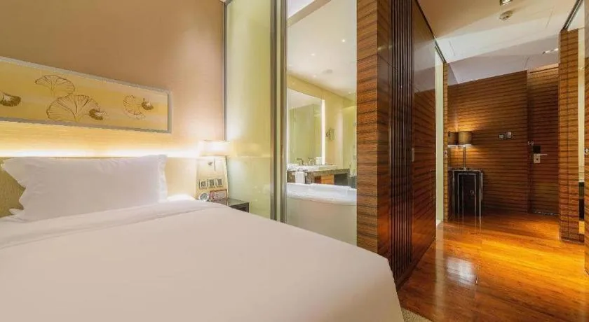 Bed in New World Guiyang Hotel