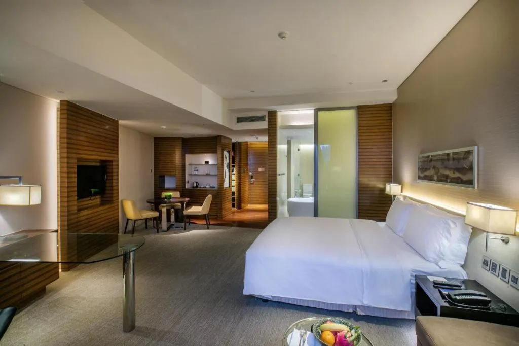 Bed in New World Guiyang Hotel