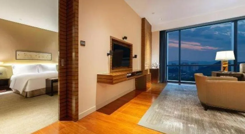 Bed in New World Guiyang Hotel