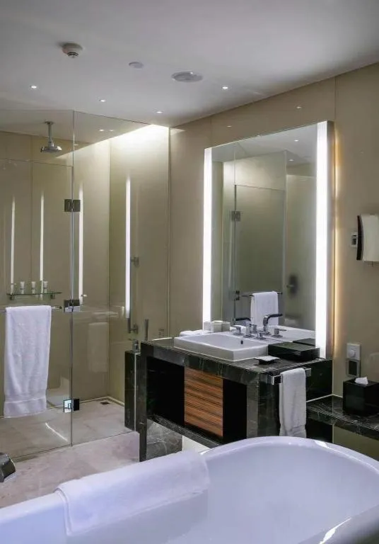 Bed in New World Guiyang Hotel