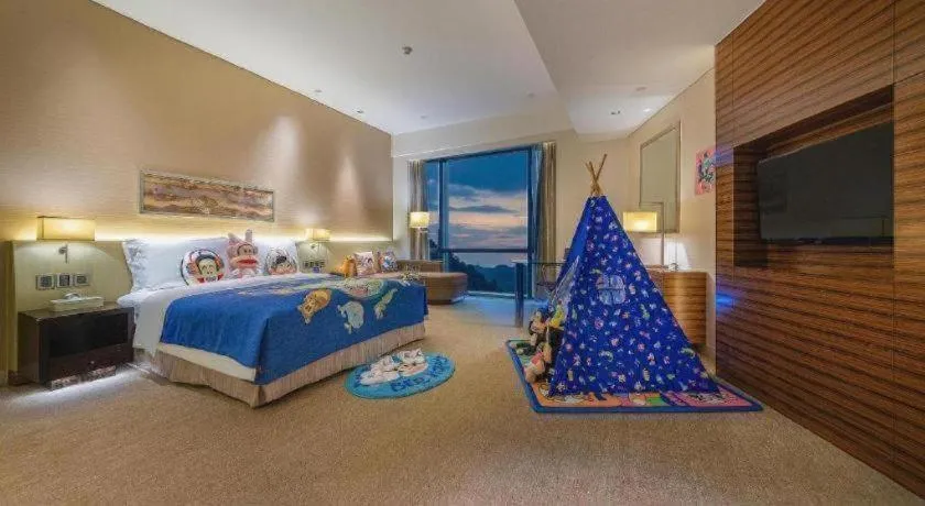 Bed in New World Guiyang Hotel