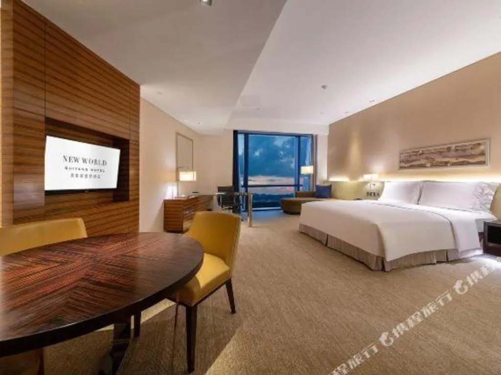 Bed in New World Guiyang Hotel