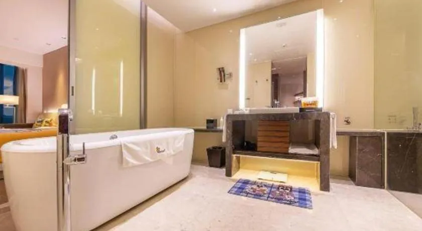 Bed in New World Guiyang Hotel