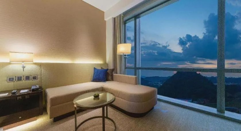 Bed in New World Guiyang Hotel