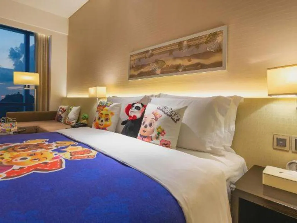 Bed in New World Guiyang Hotel
