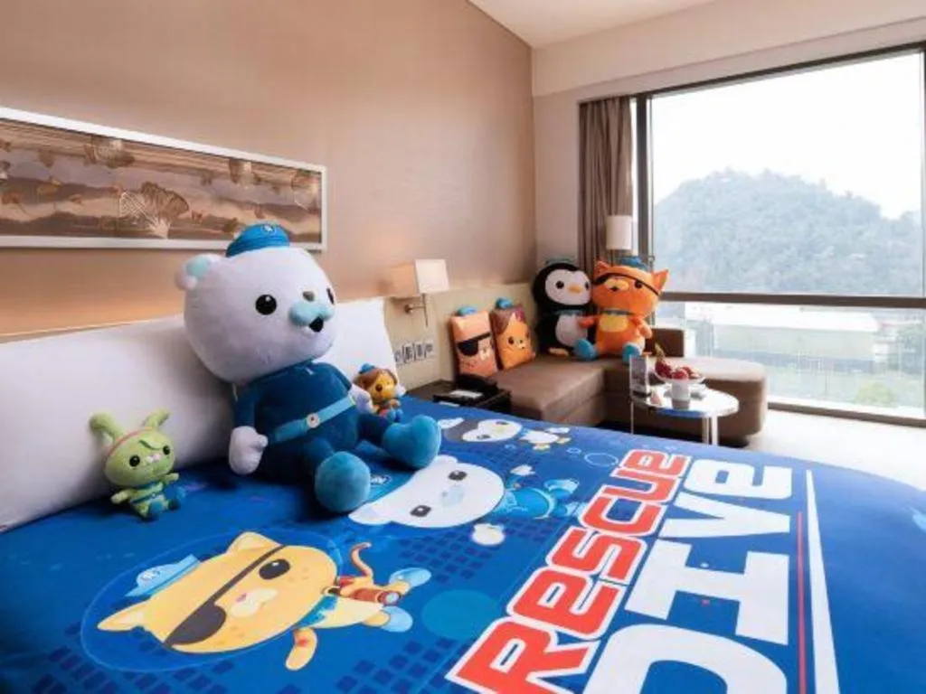 Bed in New World Guiyang Hotel