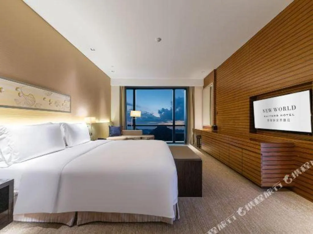 Bed in New World Guiyang Hotel