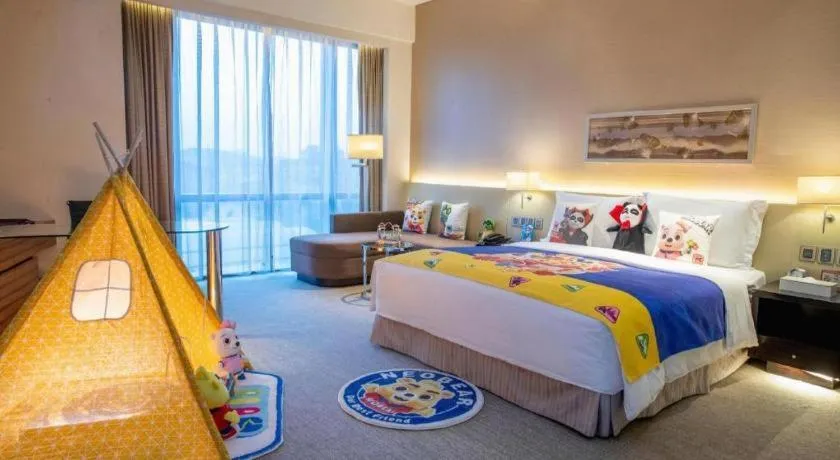 Bed in New World Guiyang Hotel