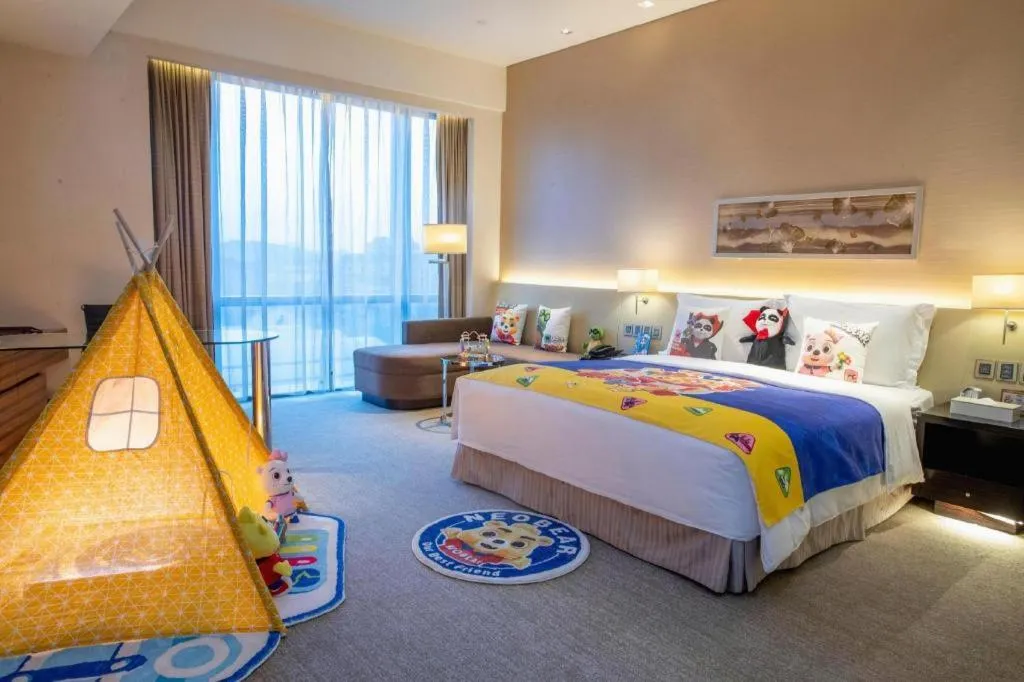 Bed in New World Guiyang Hotel