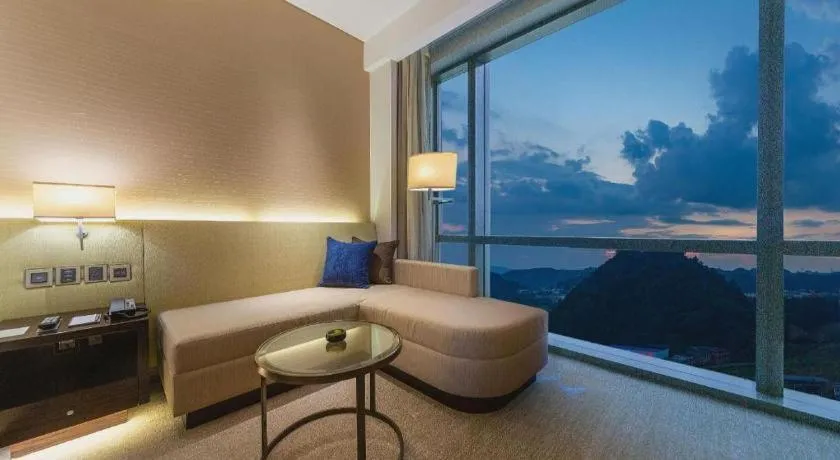 Bed in New World Guiyang Hotel