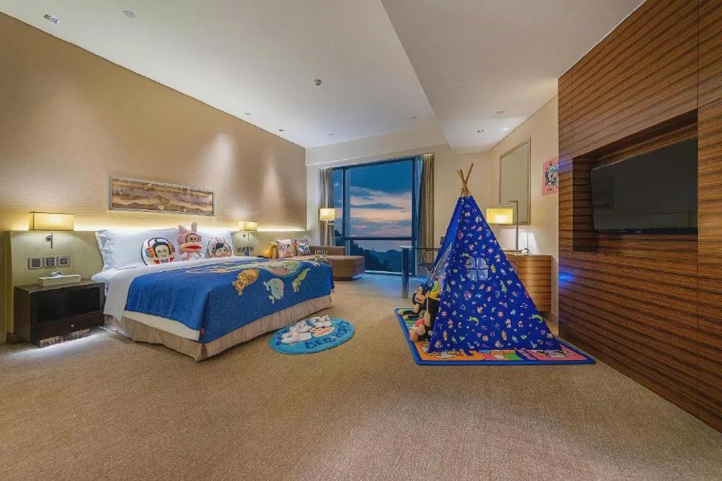 Bed in New World Guiyang Hotel