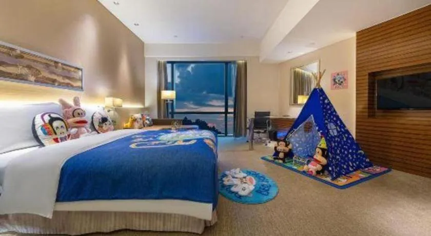 Bed in New World Guiyang Hotel