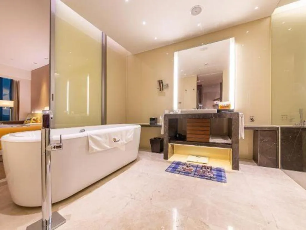 Bed in New World Guiyang Hotel