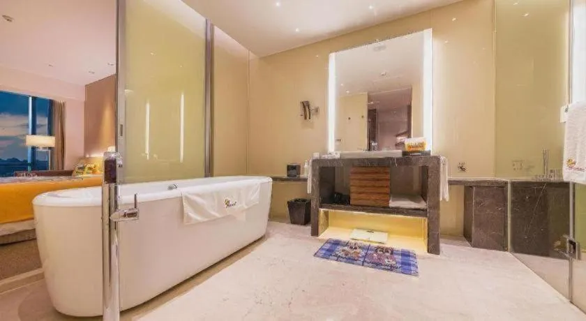 Bed in New World Guiyang Hotel