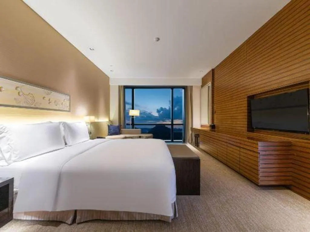 Bed in New World Guiyang Hotel