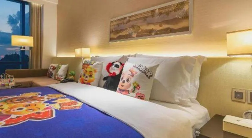Bed in New World Guiyang Hotel