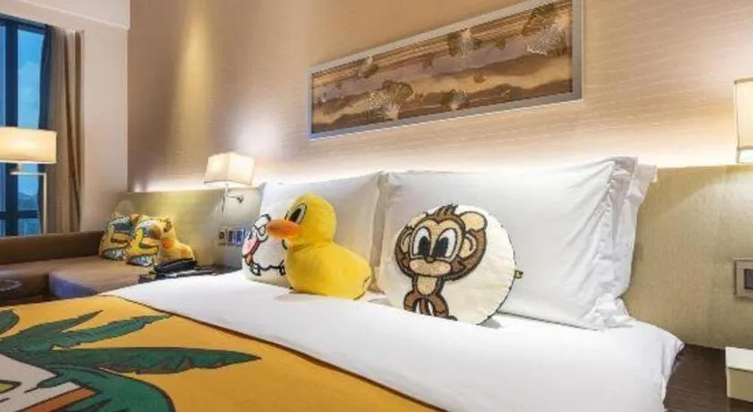 Bed in New World Guiyang Hotel