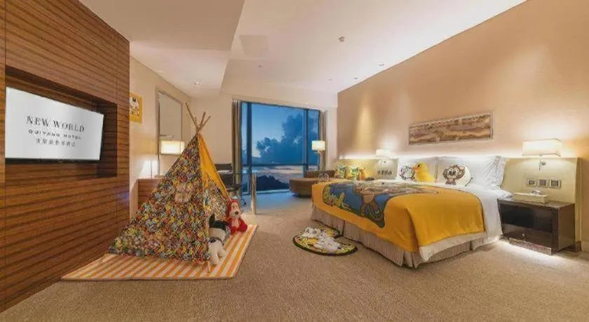 Bed in New World Guiyang Hotel