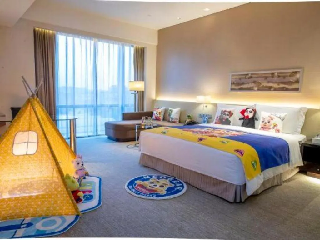 Bed in New World Guiyang Hotel