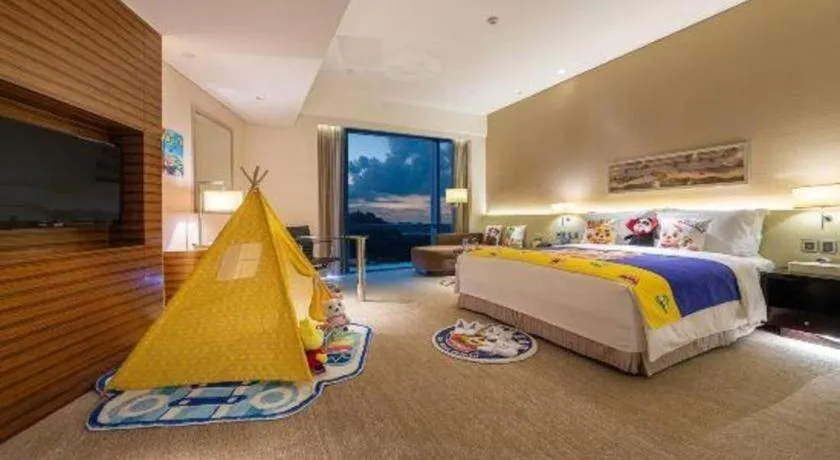 Bed in New World Guiyang Hotel