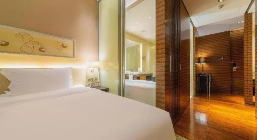 Bed in New World Guiyang Hotel