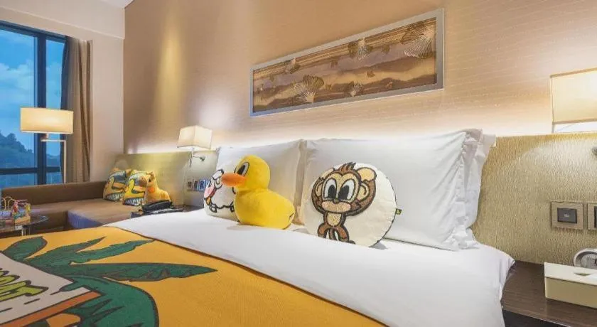 Bed in New World Guiyang Hotel