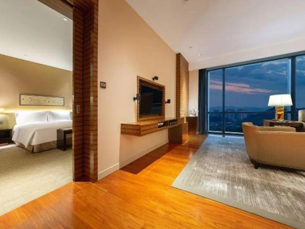 Bed in New World Guiyang Hotel