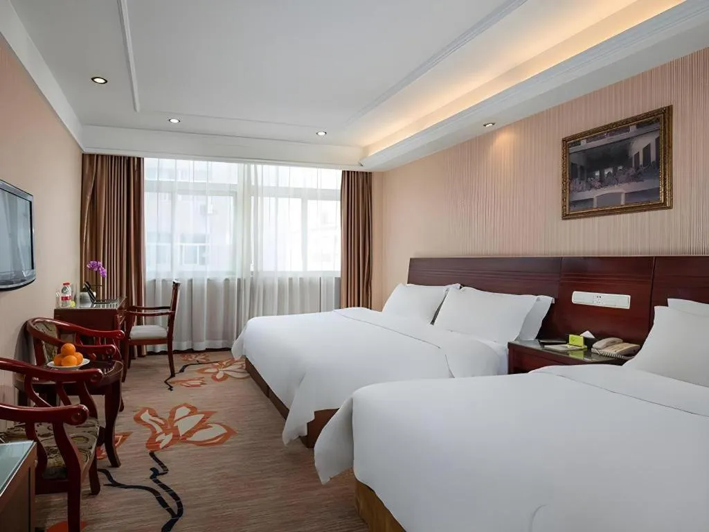 Bed in Vienna Hotel Hangzhou Binkang Road Metro Station