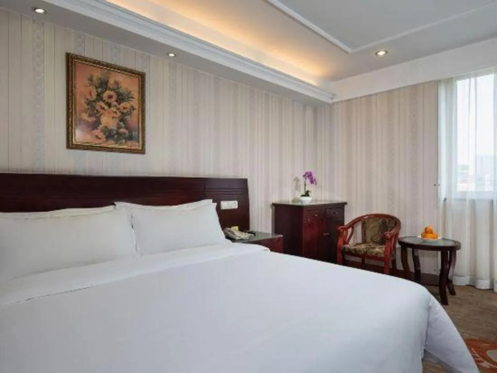 Bed in Vienna Hotel Hangzhou Binkang Road Metro Station