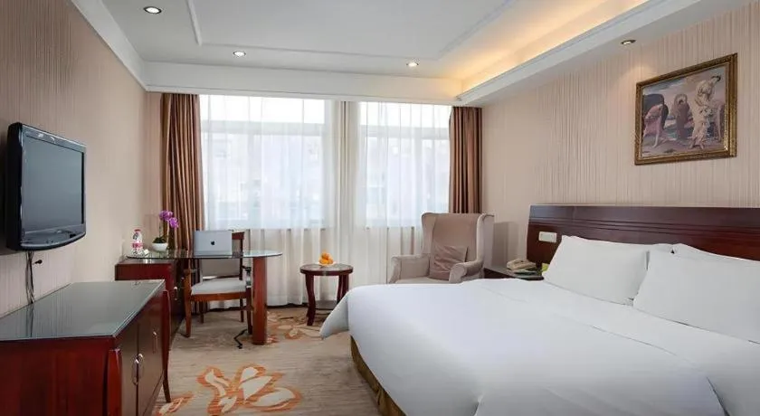 Bed in Vienna Hotel Hangzhou Binkang Road Metro Station