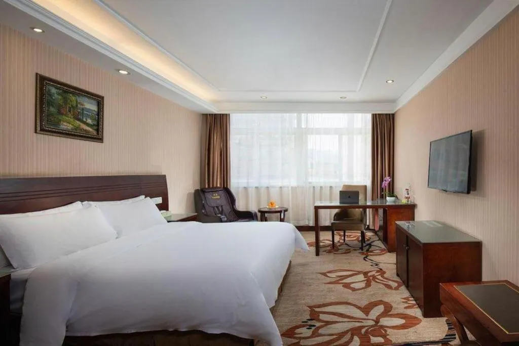 Bed in Vienna Hotel Hangzhou Binkang Road Metro Station