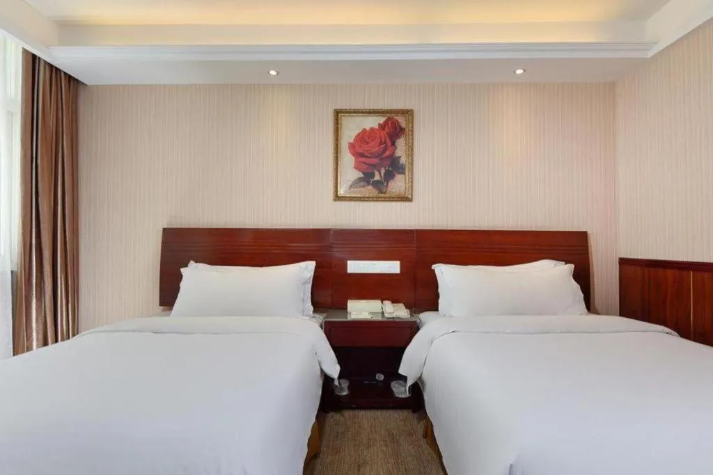 Bed in Vienna Hotel Hangzhou Binkang Road Metro Station