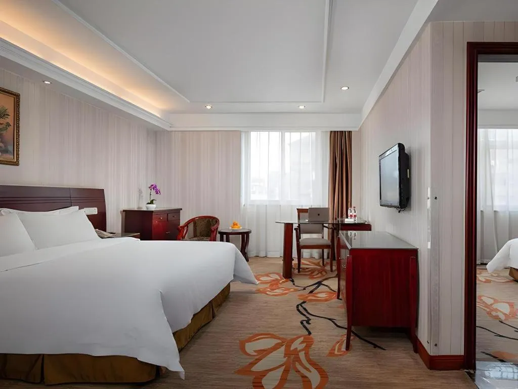 Bed in Vienna Hotel Hangzhou Binkang Road Metro Station