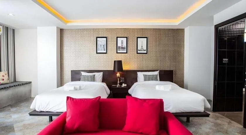 Bed in M Boutique Resort