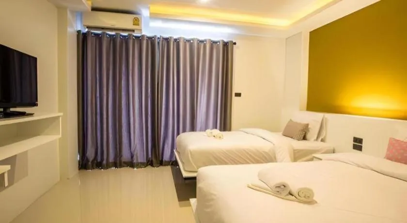 Bed in M Boutique Resort