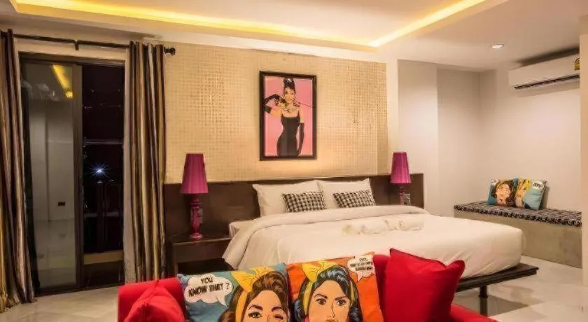 Bed in M Boutique Resort