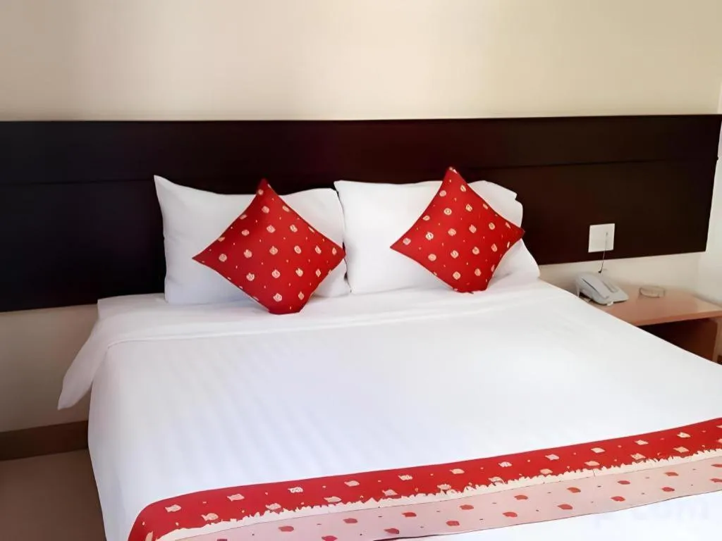 Bed in Grand Vissanu Hotel