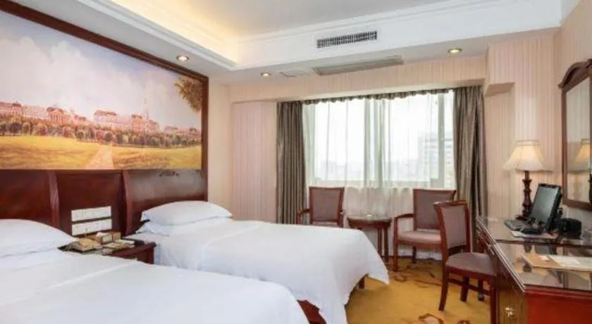 Bed in Vienna Hotel Nanning Train Station