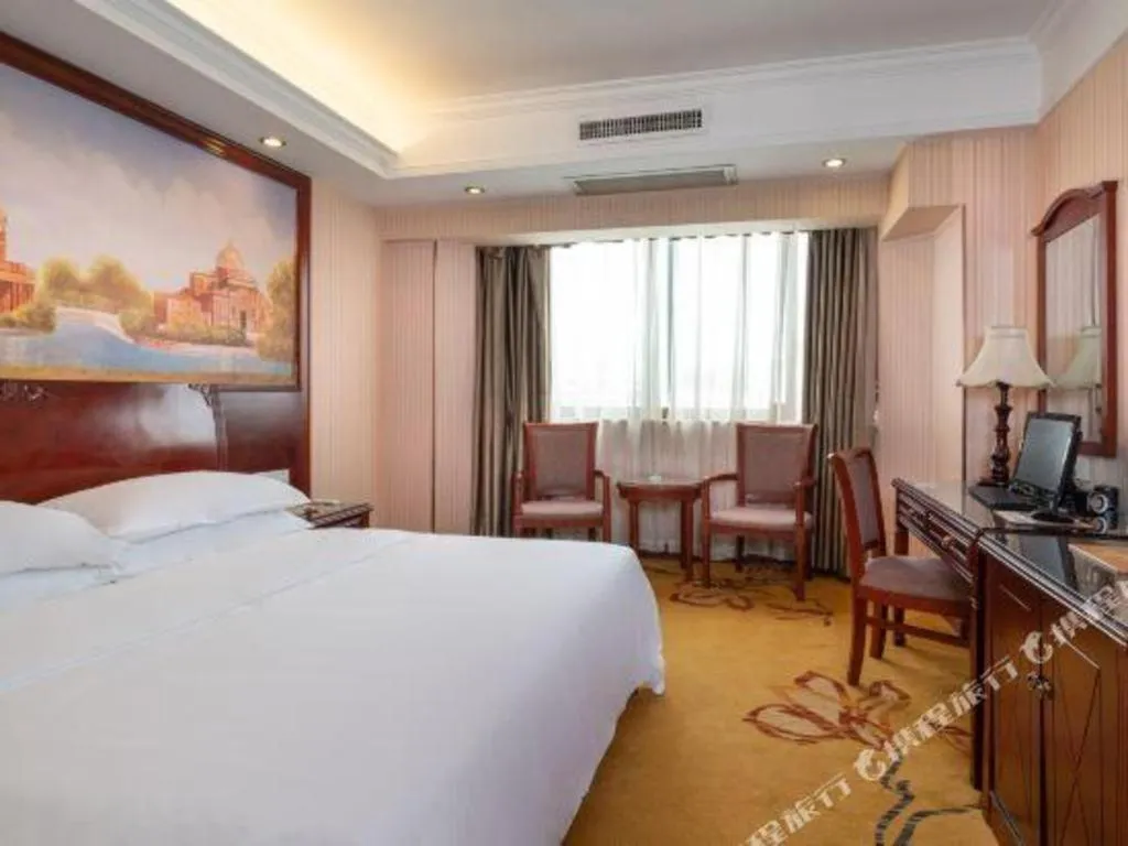 Bed in Vienna Hotel Nanning Train Station