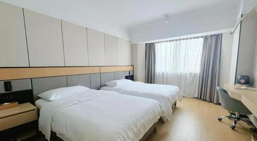 Bed in Vienna Hotel Nanning Train Station