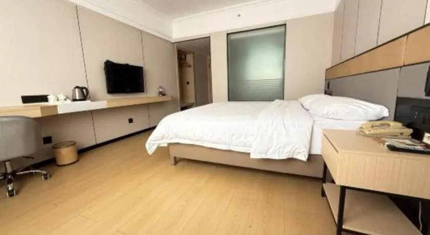 Bed in Vienna Hotel Nanning Train Station