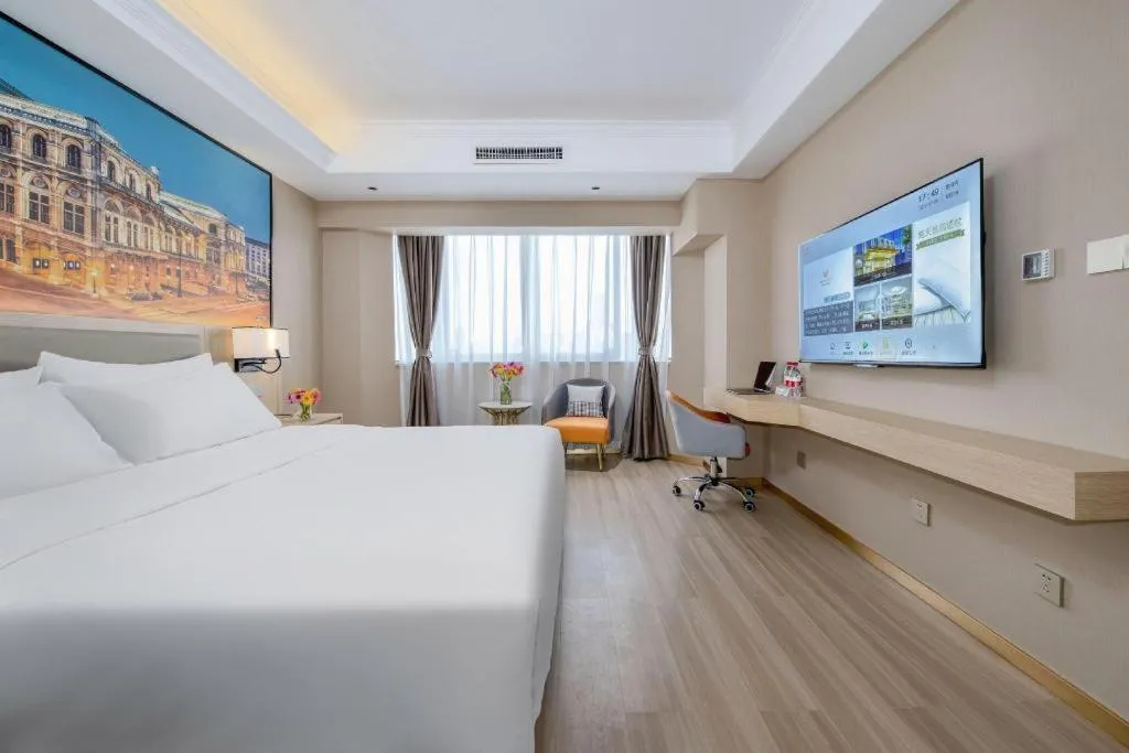 Bed in Vienna Hotel Nanning Train Station