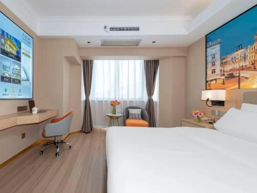 Bed in Vienna Hotel Nanning Train Station