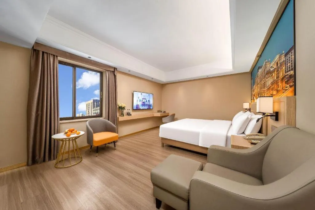 Bed in Vienna Hotel Nanning Train Station